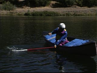 Rolling a Solo Whitewater Canoe